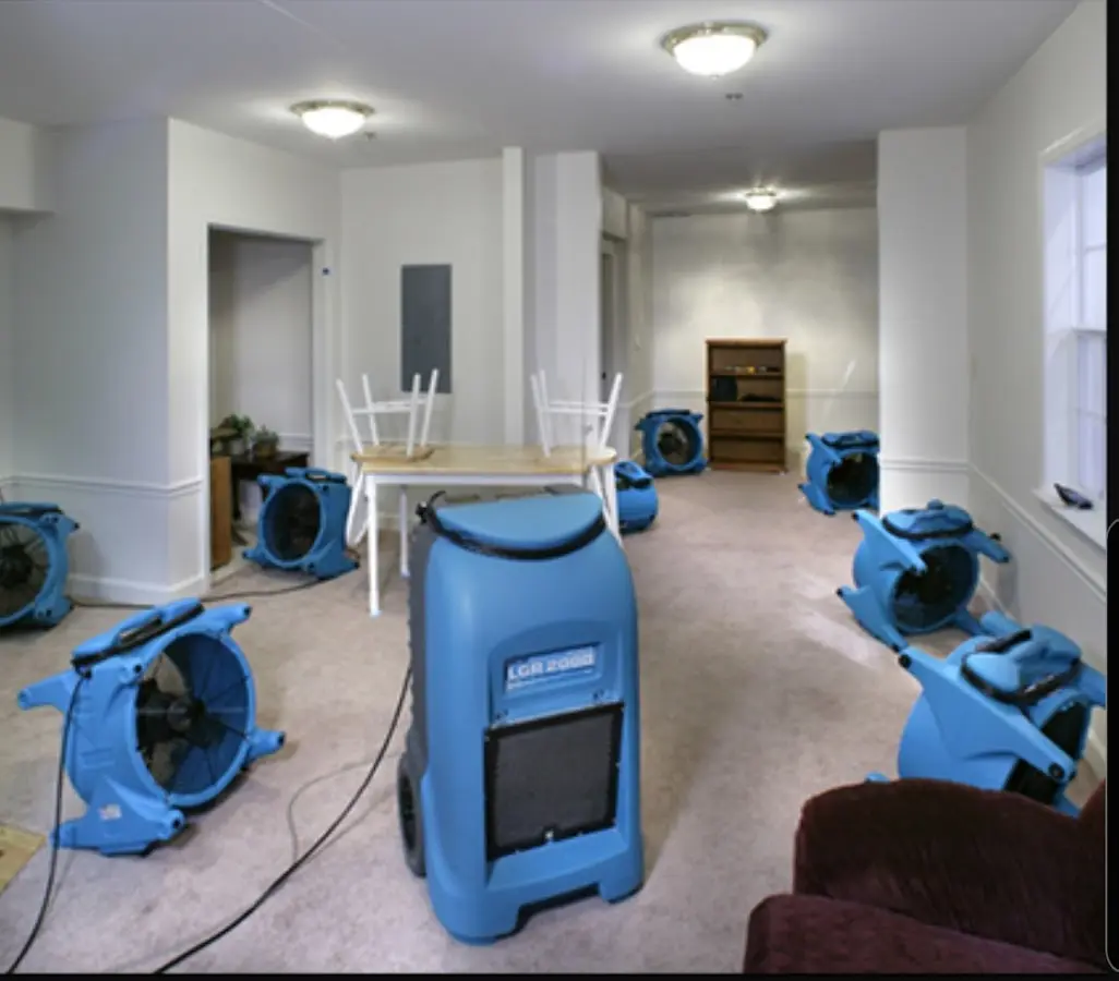 Air movers and dehumidifier setup for Water Damage Restoration in Raritan